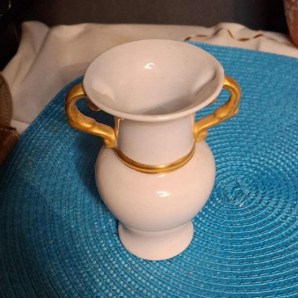 Elegant White Vase with Gold Accents